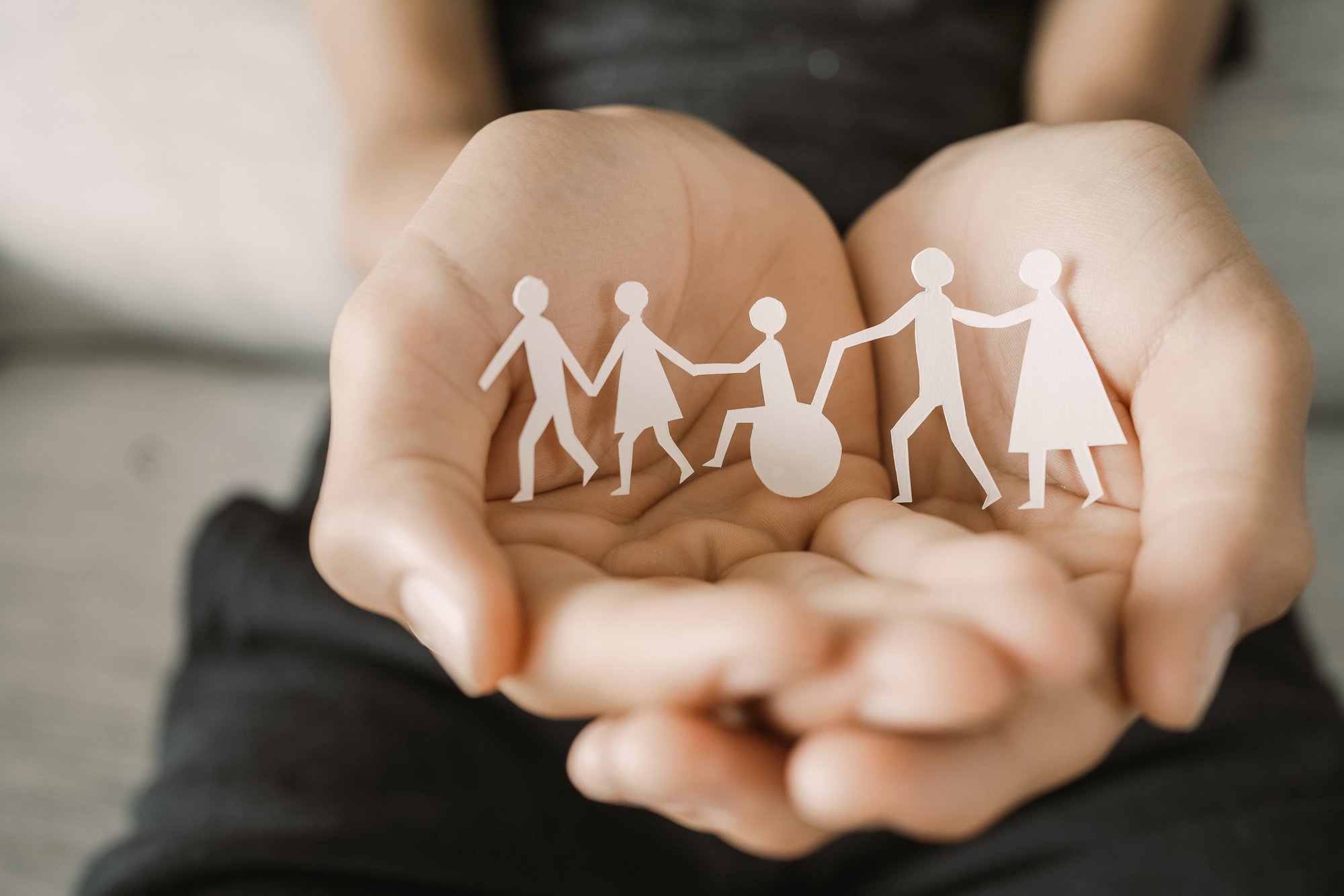 Hands with cut outs_shutterstock_2215254241