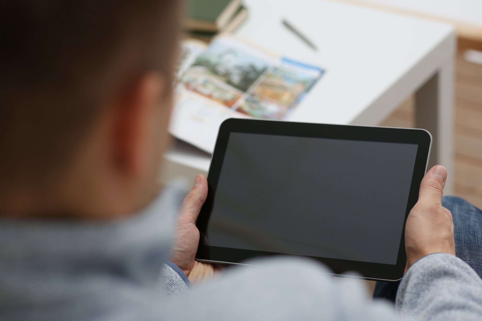 Man and IPad_shutterstock_771756772